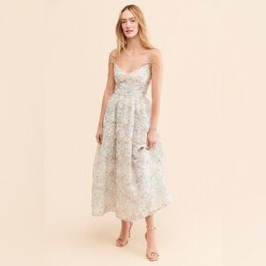 Tosca Midi Dress
En Saison